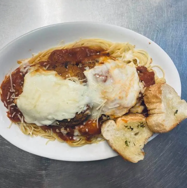 Chicken Parmigiana over Angel Hair Pasta